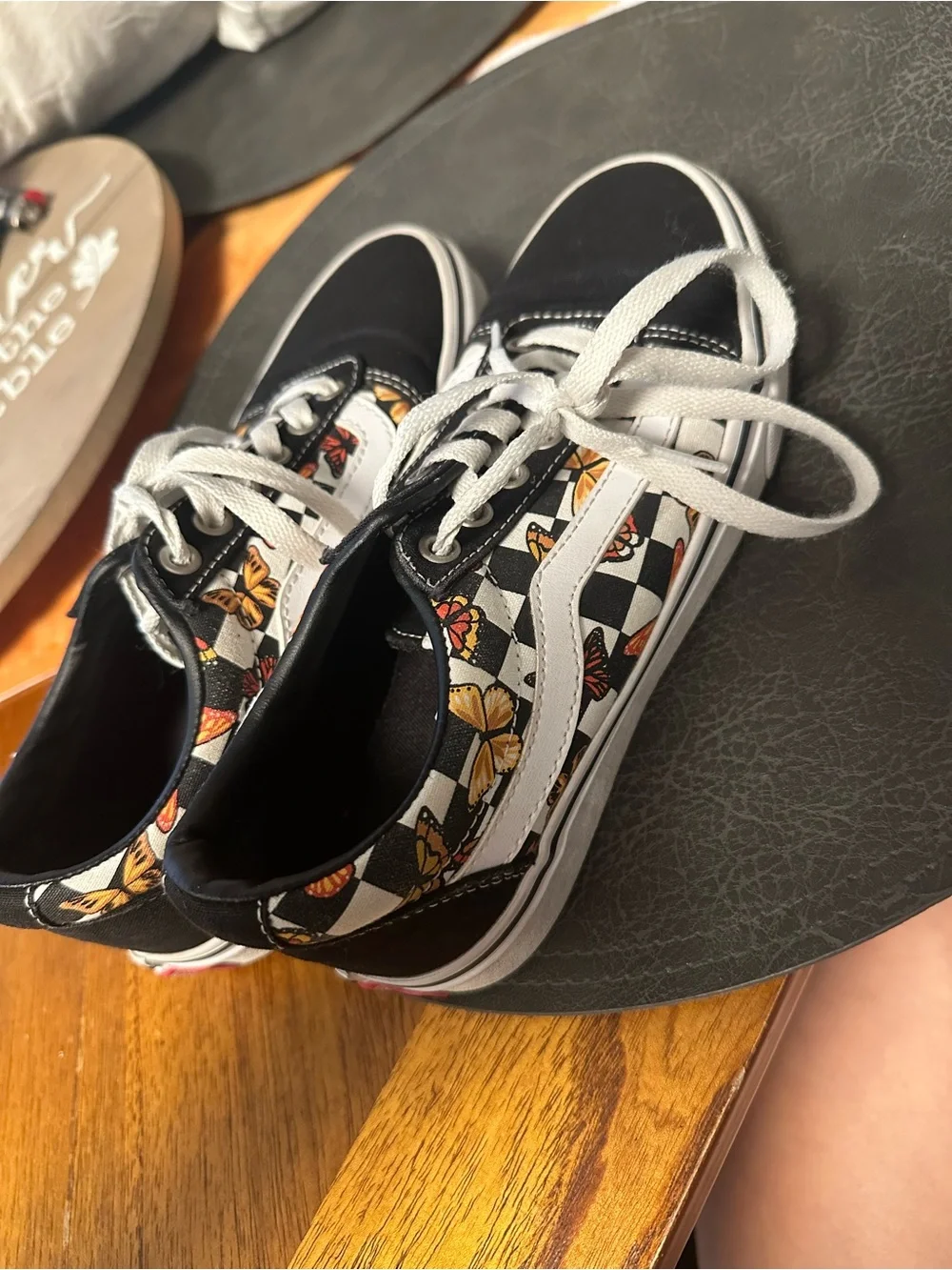 Vans women’s Black Checkerboard Butterfly Low-Top Sneakers with White Stripe
